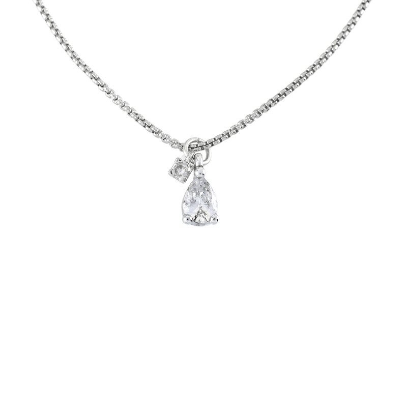 The DROP ZIRCONIA NECKLACE which is made of 1mm wide Stainless steel chain with two 18K gold plated sterling silver pave drop charms., one is a mini zirconia charm.