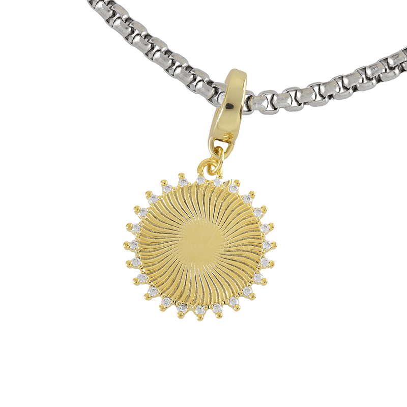 The SUNSHINE BULKY CHARM which is made of 18K gold plated sterling silver with encrusted zirconia sunburst charm.