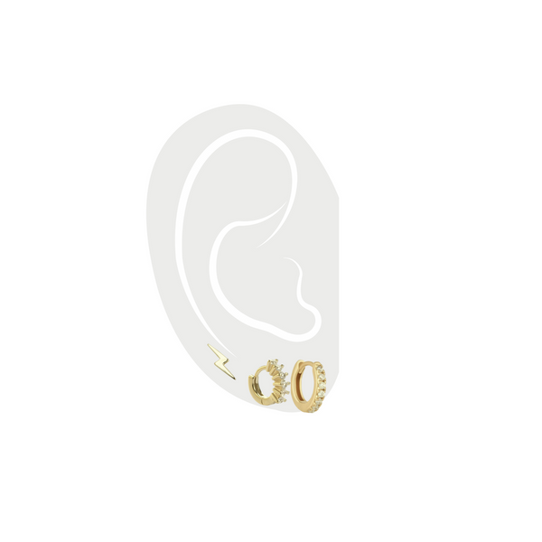The ELBA EAR SET - 3 & 2 HOLES which comes with five earrings. a pair of tiny huggies earrings, pair of MINI CLEAR GOLD HUGGIES that are 18k gold plated with cubic zirconia and one tiny lightning earring in gold as well.