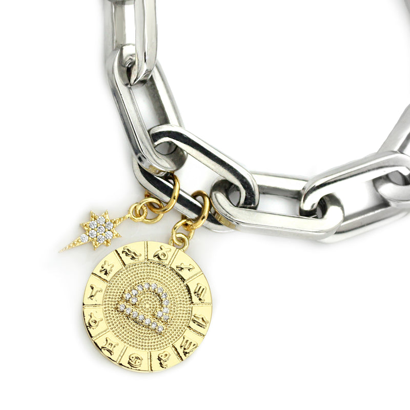 The ZODIAC PUERTO BRACELET- Libra made of 8" Hypoallergenic Rhodium Plated Stainless Steel chain with 20mm Gold Filled Libra Zodiac Charm with Micro Pave Constellation.