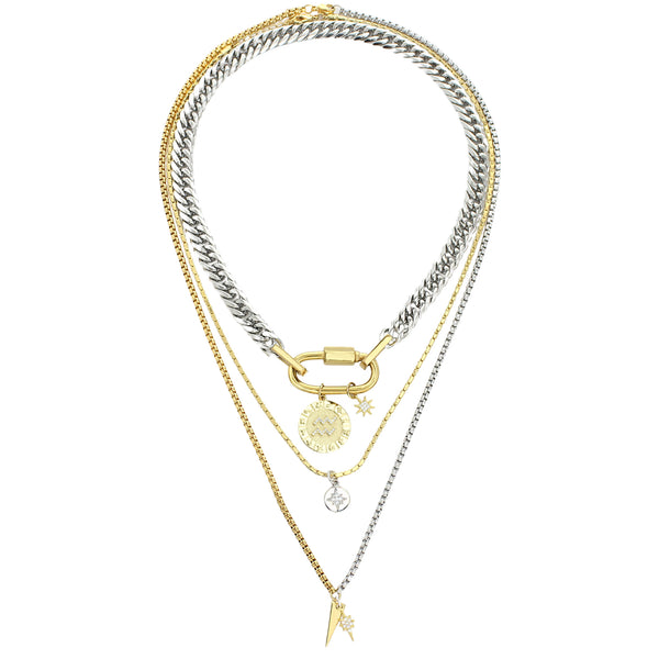 The Anne Zodiac Necklace which is a three pieces layered necklace set. Includes one silver chain with 18k gold plated carabiner and Gold Filled AQUARIUS Zodiac with Micro Pave Constellation charm, thin gold necklace with silver circle charm and another long necklace in half gold and silver with spike shaped charm and Gold Plated Micro Pave Studded Star.