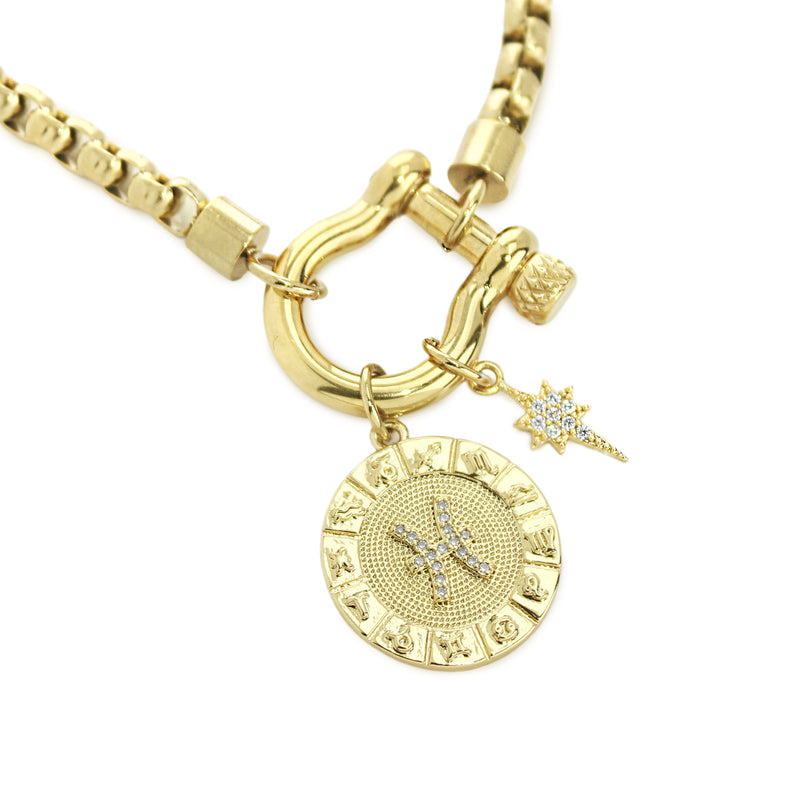The Pisces Herradura Zodiac Necklace which is made of 18” Hypoallergenic Gold Plated Stainless Steel chain with 18K Gold Plated Horseshoe clasp and miniature star pendant and circular star sign micro pave Pisces constellation charm.
