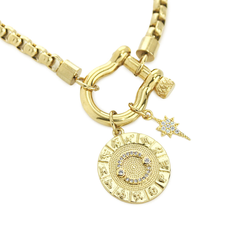 The Cancer Herradura Zodiac Necklace which is made of 18” Hypoallergenic Gold Plated Stainless Steel chain with 18K Gold Plated Horseshoe clasp and miniature star pendant and circular star sign micro pave Cancer constellation charm.