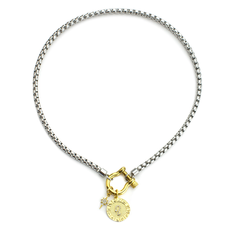 The Leo Herradura Zodiac Necklace which is made of 18” Hypoallergenic Rhodium Plated Stainless Steel chain with 18K Gold Plated Horseshoe clasp and miniature star pendant and circular star sign micro pave Leo constellation charm.