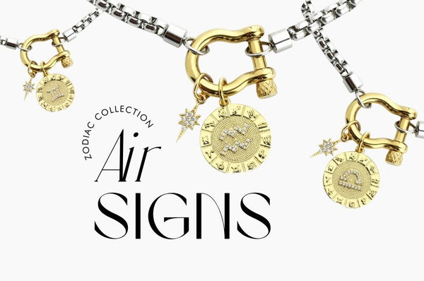 Close up of three Artizan Herradura Necklaces of Zodiac Signs showing text that reads "Zodiac Collection Air Signs"