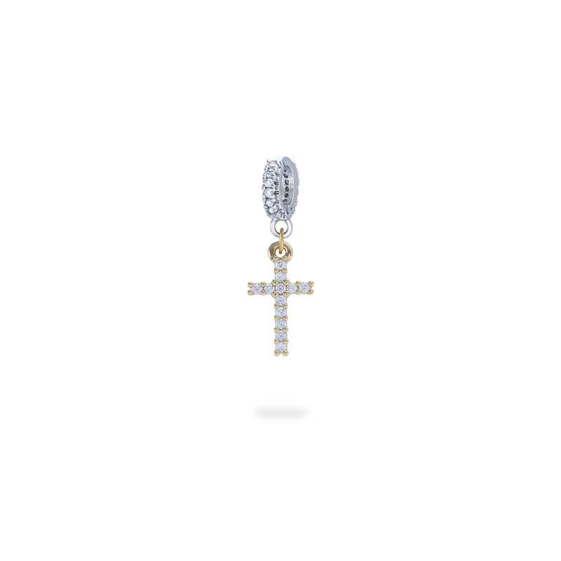 The Cross Clip On Charm, a gold charm featuring a cross design accented with pave diamonds and the celestial charm.