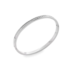 The DUST BANGLE, which is a single silver bracelet, features a refined and polished design highlighted by a sparkling row of stones along its sleek band. This elegant piece is perfect for wearing alone or stacking with other bracelets for a sophisticated, versatile style. ||| SILVER