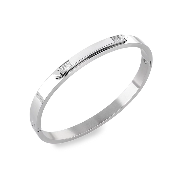 The Arrow Bangle, a silver bangle with diamond-like accents.