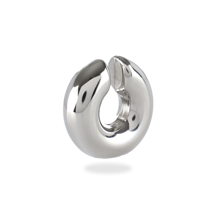 The Chunky Bagel Ear Cuff, a silver ear cuff with a thick, rounded design. ||| SILVER
