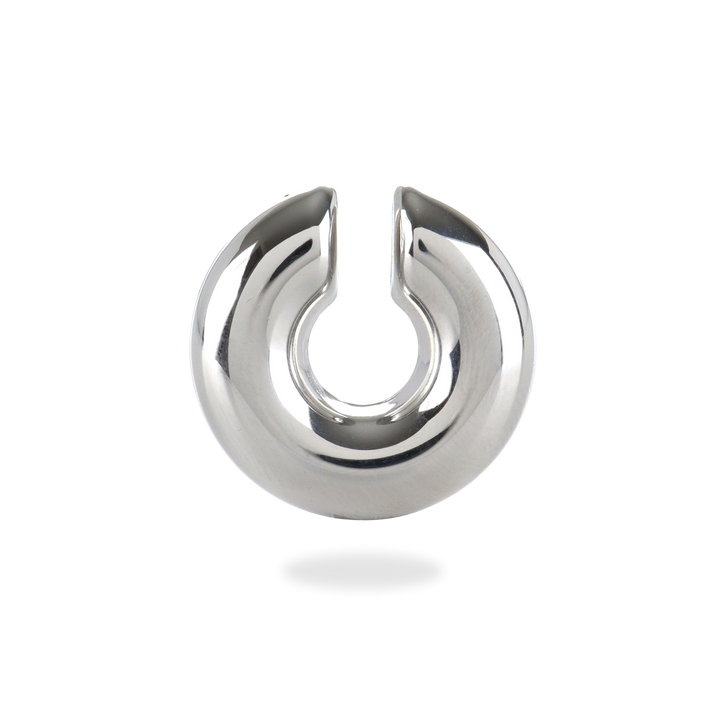 The Chunky Bagel Ear Cuff, a silver ear cuff with a thick, rounded design. ||| SILVER