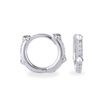 The Touch Spike Hoop, a silver hoop earring with a unique spike design and accents of sparkling cubic zirconia stones.