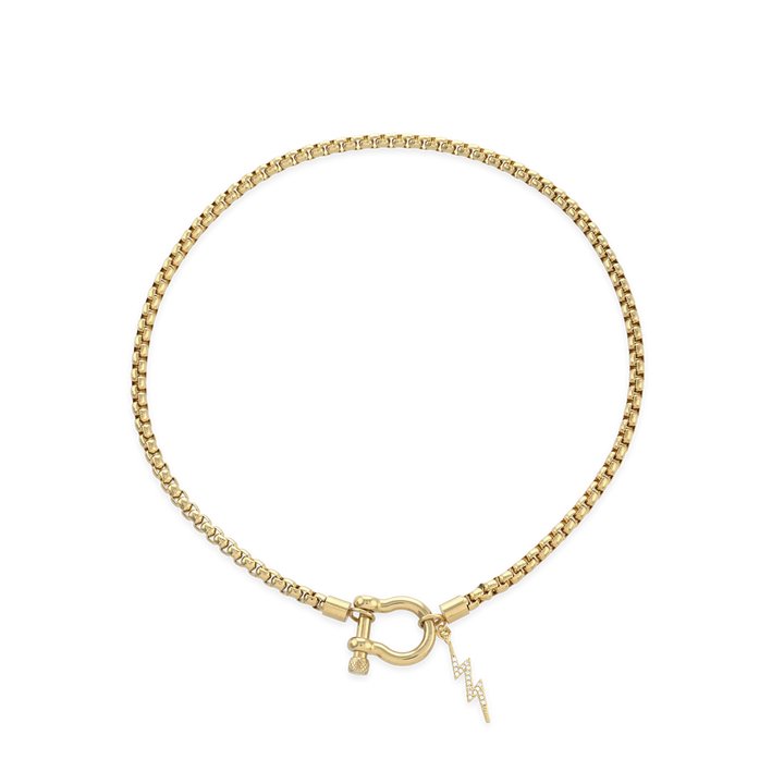 The Herradura Thunder Necklace - Gold, a gold necklace with a lightning bolt charm and a unique horseshoe clasp.