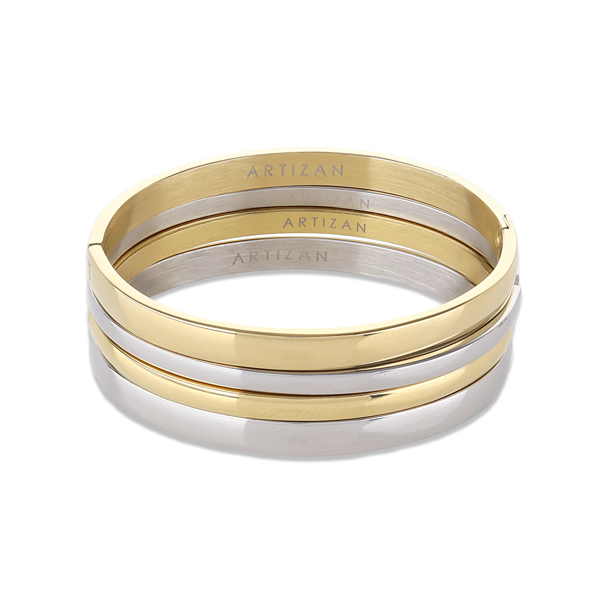 The Plain Medium Set, which is a multi-piece bracelet stack, features alternating gold and silver bangles with a sleek, polished finish, offering a chic and versatile design perfect for stacking together or wearing individually for a refined look.