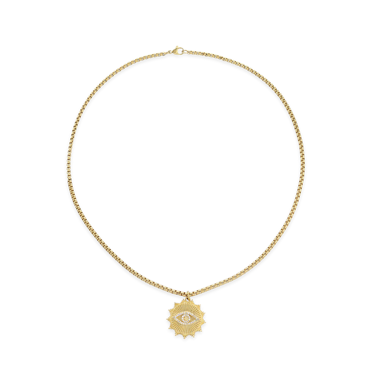 The I See Necklace, a luxurious gold chain with a  unique eye-shaped pendant adorned with sparkling diamonds.