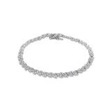 The Spiga Tennis Bracelet, a silver bracelet with a wheat link chain design and diamond-like stones.