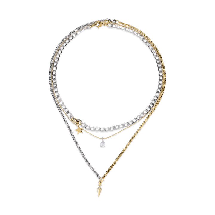 The SHINI SPIKE TRIO SET, which is a stunning layered necklace set featuring three intricately designed chains in mixed metals of gold and silver. This set includes bold chain links, delicate pendants including a star, teardrop, and spike charm, creating a modern and versatile accessory for any outfit.