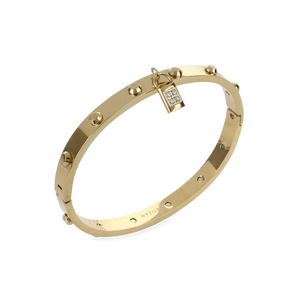 The Lock Bangle, which is a single gold bangle, features a studded design and a sparkling lock charm detail. This elegant piece in gold adds a secure, stylish touch with its distinct lock motif and subtle shimmer, perfect for making a bold statement on its own.






