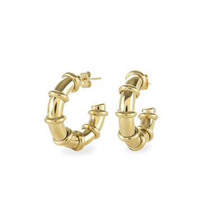 The Ringed-Up Bagel Hoops, a stunning pair of gold hoop earrings featuring a distinctive segmented design inspired by the shape of a bagel. 