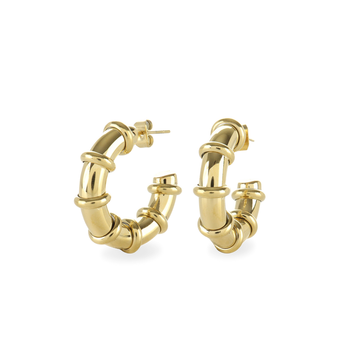 The Ringed-Up Bagel Hoops, a stunning pair of gold hoop earrings featuring a distinctive segmented design inspired by the shape of a bagel. 