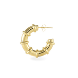 The Ringed-Up Bagel Hoops, a stunning pair of gold hoop earrings featuring a distinctive segmented design inspired by the shape of a bagel. 
