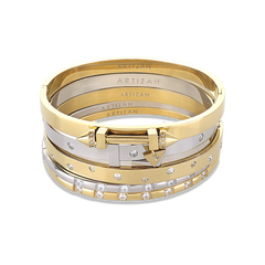 The Triangle Stack, a five-piece bangle set featuring gold and silver bangles with cubic zirconia accents and a triangle clasp detail.