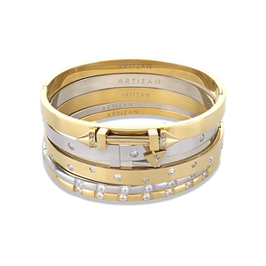 The Triangle Stack, a five-piece bangle set featuring gold and silver bangles with cubic zirconia accents and a triangle clasp detail.