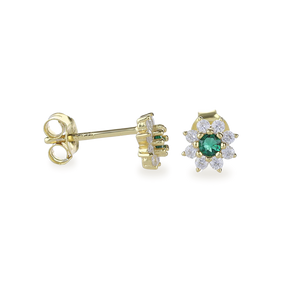 The Emerald Flower Stud Earrings, a pair of delicate gold earrings featuring a central green emerald surrounded by a halo of petal-like sparkling white stones, creating a floral design. These elegant studs add a charming and feminine touch, perfect for both everyday wear and special occasions.