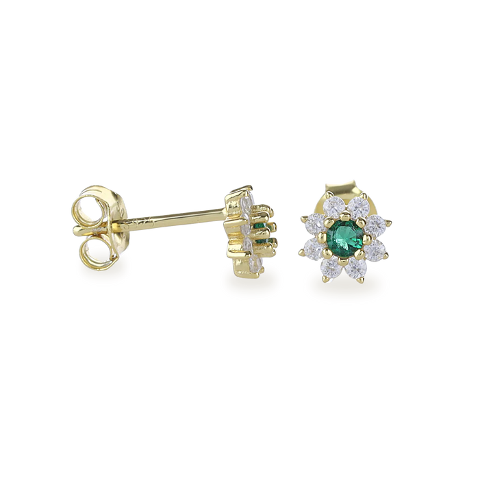 The Emerald Flower Stud Earrings, a pair of delicate gold earrings featuring a central green emerald surrounded by a halo of petal-like sparkling white stones, creating a floral design. These elegant studs add a charming and feminine touch, perfect for both everyday wear and special occasions.