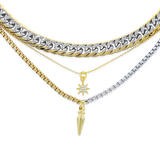 The Mix Set, which is a layered necklace set featuring four stunning pieces, combines gold and silver tones with intricate details. This versatile stack includes bold chain links, delicate pendants like a star charm and a pointed drop, creating a modern and chic mixed-metal look perfect for layering