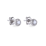 The Mini Stud Earring, which is a pair of delicate silver-tone earrings featuring a sparkling round-cut stone encased in a halo design, perfect for adding subtle elegance to any look.