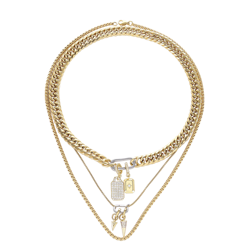 The Just Click Tag Necklace Set, a four-piece gold necklace set featuring a Cuban link chain, a box chain, and a rope chain with diamond-like accents, two dog tag charms, and a spike charm.