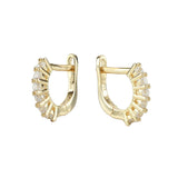 The Prong Hoops, which are a pair of stunning gold hoop earrings, feature dazzling prong-set crystals for an elegant and timeless design. These earrings are crafted with precision and are perfect for elevating any look, whether worn alone or layered with other jewelry pieces. ||| GOLD