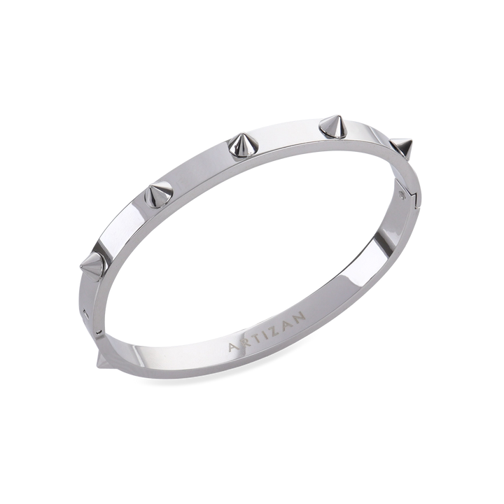 The Spikes Bangle in silver, a silver bangle with spike accents. ||| SILVER