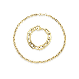 The PUERTO SIZE SET, which is a gold two-piece jewelry set, features a bold link chain necklace and a matching chunky bracelet. The set’s polished gold finish and statement design make it perfect for elevating any outfit, whether casual or formal, with a touch of modern elegance.