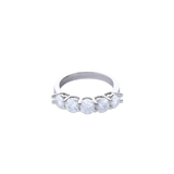 The Diamond Band Ring, a silver ring featuring five dazzling brilliant-cut diamonds.