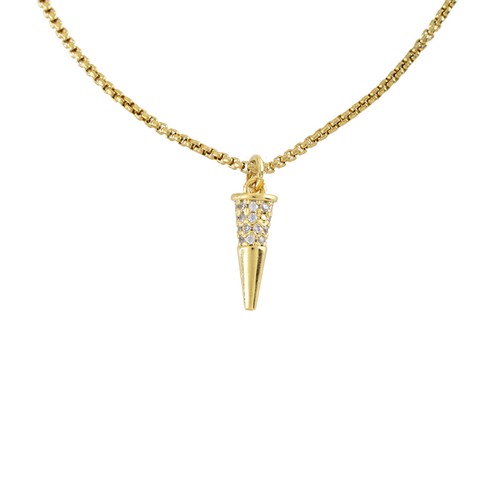 The Spike Pave Necklace, a gold necklace featuring a delicate chain and a spike pendant accented with diamond-like stones.