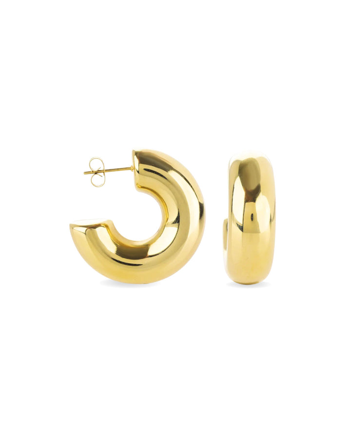 The Bagel Hoop, a pair of chunky gold hoop earrings with a rounded, torus shape.