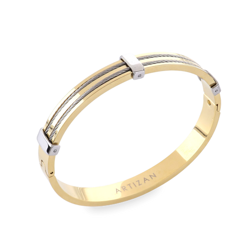 The MARINERO BANGLE, which is a single gold-tone bracelet, features sleek, parallel silver wires along its top surface, creating a refined two-tone nautical-inspired design. This elegant piece by Artizan adds a sophisticated touch with its polished finish and sturdy construction, ideal for daily wear or special occasions. ||| GOLD