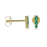 The Emerald Pyramid Stud Earring, a single gold stud featuring a trio of vibrant green emerald stones arranged in a vertical pyramid shape. This modern and eye-catching design adds a unique geometric element to any look, perfect for stacking or wearing alone as a bold statement piece.