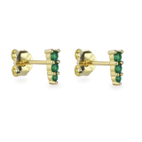 The Emerald Pyramid Stud Earrings, a pair of gold studs featuring three vertically stacked green emerald stones in a sleek pyramid arrangement. These elegant earrings offer a modern, geometric style, adding a pop of vibrant color to any outfit while maintaining a sophisticated and minimalistic look.
