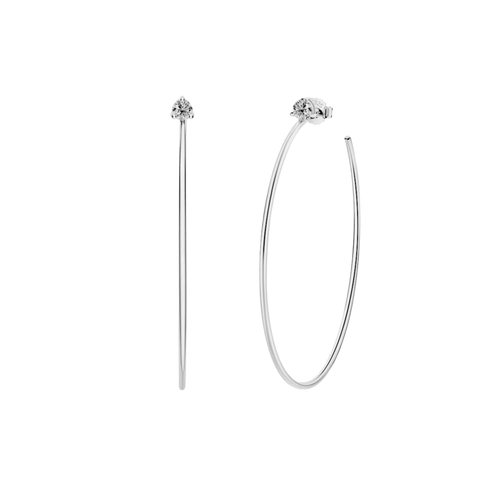 The Solitaire Hoop, a pair of silver hoop earrings, with a single diamond-like stone stud.