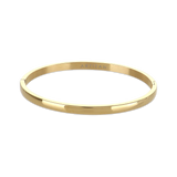 The Plain Bangle, which is a single-piece gold bangle, features a smooth and polished finish, offering a timeless and minimalist style that works perfectly on its own or stacked with other bangles for an elegant touch. ||| GOLD