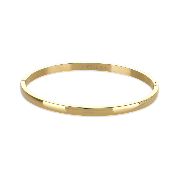 The Plain Bangle, which is a single-piece gold bangle, features a smooth and polished finish, offering a timeless and minimalist style that works perfectly on its own or stacked with other bangles for an elegant touch. ||| GOLD