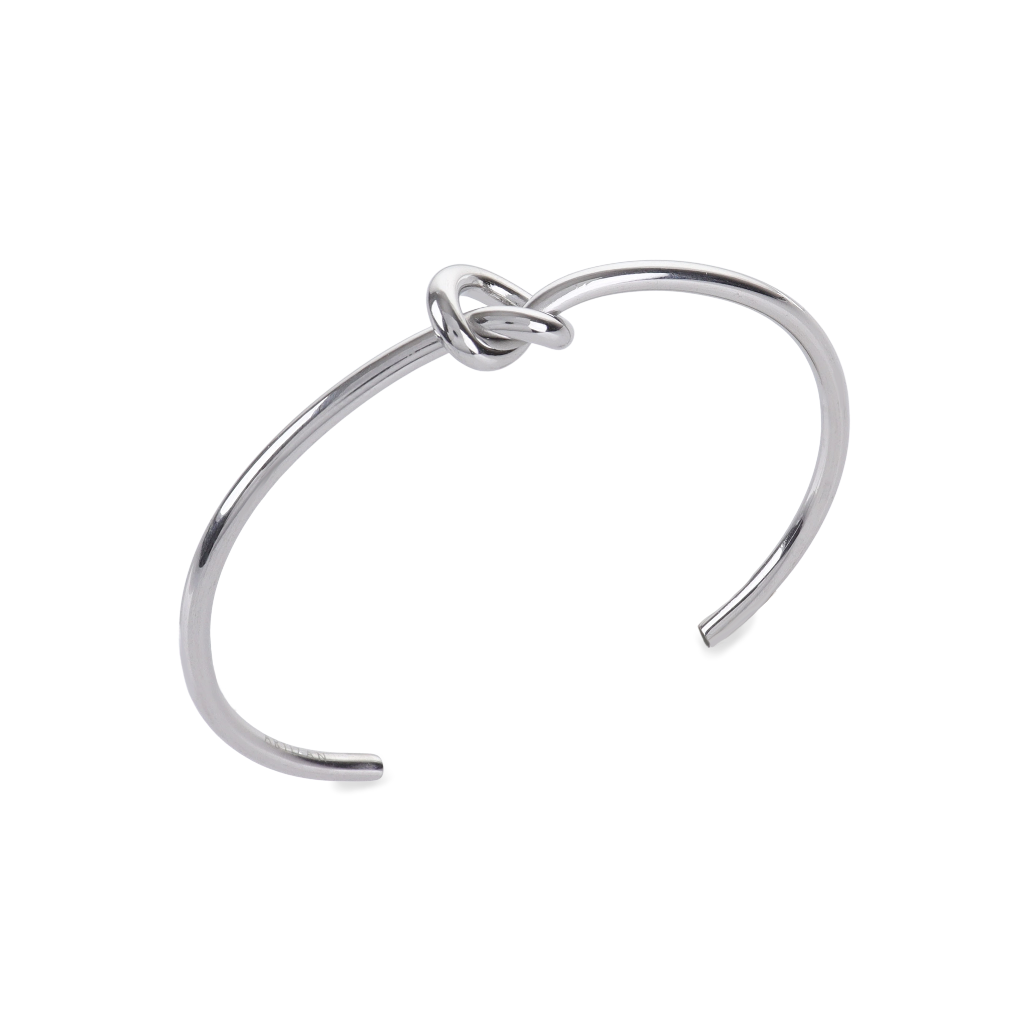 The KNOT, a single elegant silver open cuff bracelet featuring a stylish knot detail at the center, designed for a minimalist and refined look ||| SILVER