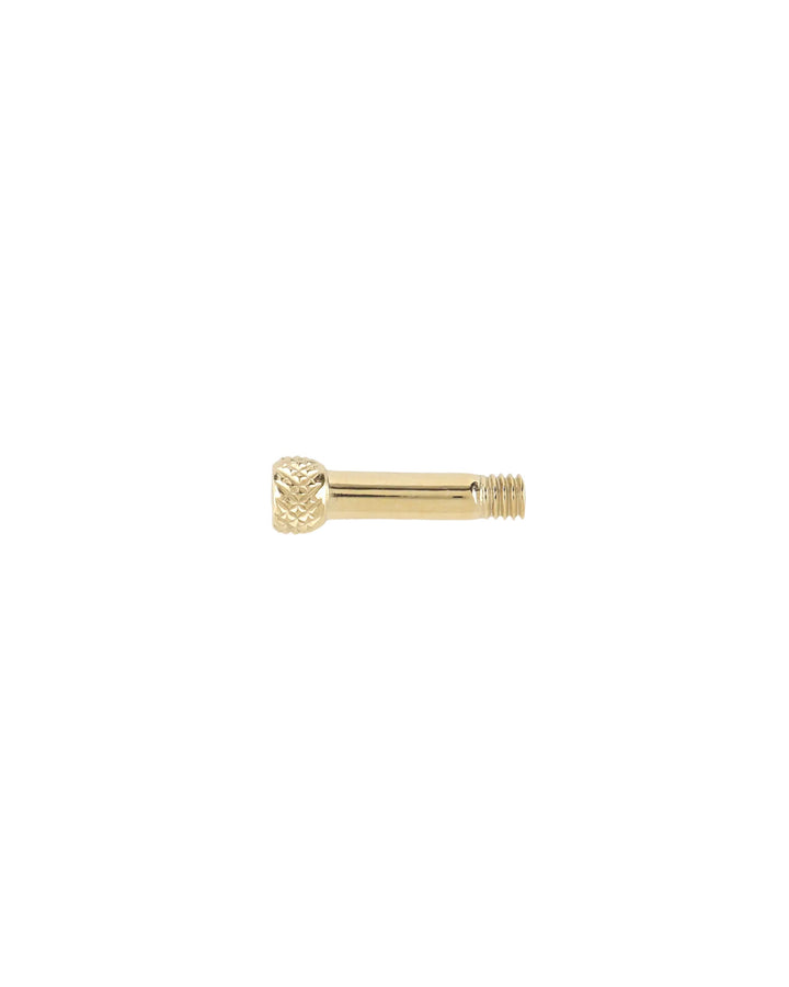 "Close-up of the Artizan Joyeria Jewelry featuring a sleek golden  screw component with a textured design, displayed on a transparent background." ||| GOLD