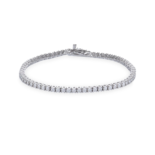 The Sparkling Thin Tennis Bracelet, which is a single-piece elegant bracelet in silver adorned with a continuous line of shimmering stones, offering a timeless and sophisticated design perfect for any occasion.