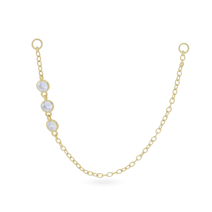 The Trio Diamond Earring Chain, a silver earring chain featuring three sparkling cubic zirconia stones.