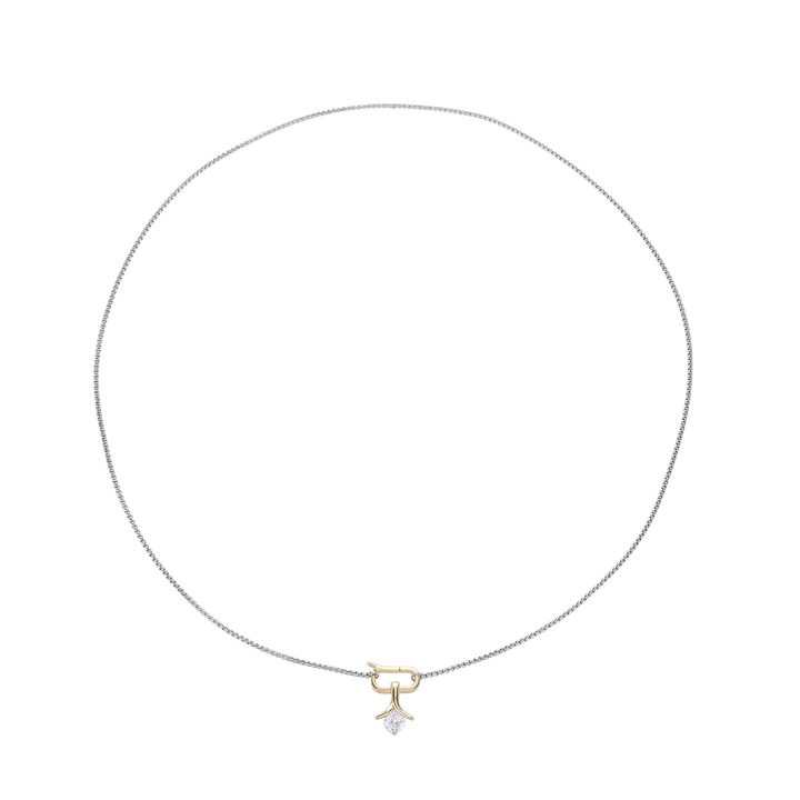 The SOLITAIRE LILY NECKLACE which is a thin mini can opener necklace with a mini diamond flower pendant.