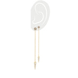 A pair of the Arrow Earring Chain, a single gold chain earring with a V-shaped arrowhead pendant adorned with sparkling stones. ||| GOLD