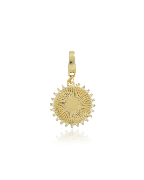 The SUNSHINE BULKY CHARM which is made of 18K gold plated sterling silver with encrusted zirconia sunburst charm.